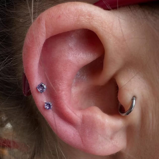 💜 Double the glow, double the style 💜

These mid-helix piercings bring the perfect pop of colour and balance.

✨ Featuring 2.5mm & 3mm Purple CZ tops
💫 Bars and tops anodised to a matching purple hue
⚡️ That shimmer hits different when light catches it
💎 Titanium precision, set for comfort and long-term wear

A subtle flex — vibrant, balanced, and perfectly aligned.
Because sometimes the details make the statement.

* We are located inside 📍 @jadedink_ 
* Call or WhatsApp us on📱 084-600-5263
* Find us on 💻 www.modifiedmonkey.co.za

#helix #midhelix #purple #anodised #purplecz #cz #czjewellery #pierced #piercings #piercing #double #modifiedmonkey #modmonkey #jadedink #bodypiercing #titanium #titaniumjewellery