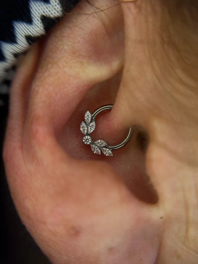 One of the best parts of a healed piercing…

The jewellery upgrade.

This client’s daith had healed beautifully, so it was finally time to swap the starter jewellery for something with a little more personality.

I absolutely love how this piece follows the natural curve of the ear. It doesn’t scream for attention, but it definitely earns a second look. 👀 😍

This is an awesome reminder that getting pierced is just the beginning. As your piercing heals, your jewellery options open up, and that’s when the styling really starts.🤩

Sometimes, all it takes is one jewellery change to make you fall in love with your piercing all over again.❤️🥰

📍Based inside @jadedink_ 
📲 WhatsApp 084 600 5263
💻 www.modifiedmonkey.co.za

#modifiedmonkey 
#daithpiercing 
#jewelleryupgrade 
#adorajewels 
#earstyling
